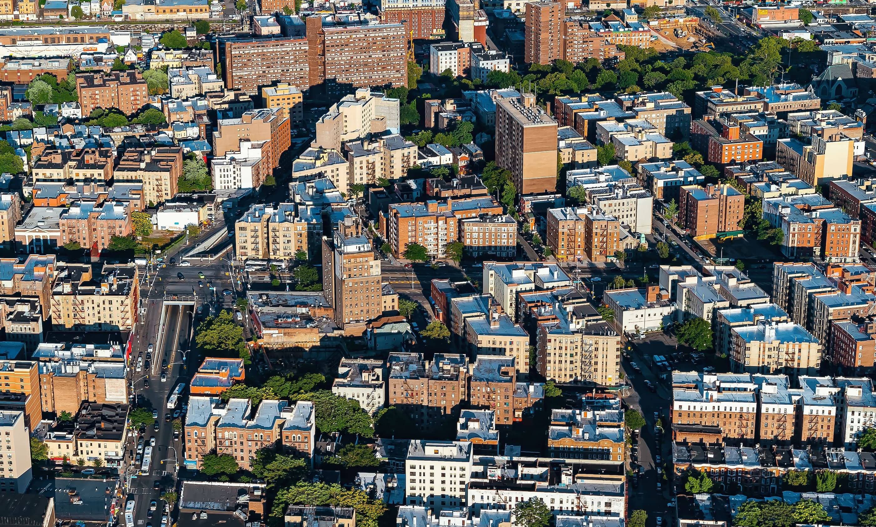 An aerial view of a city with many buildings.