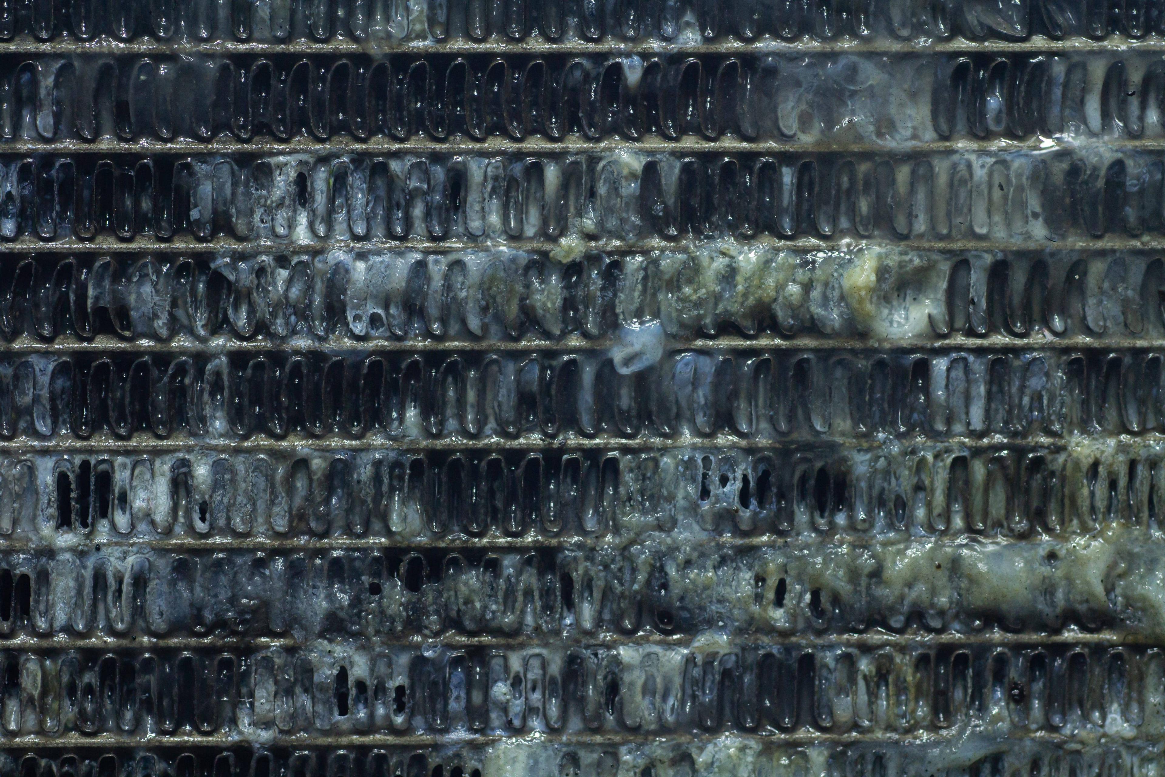 A picture of a radiator with a lot of water on it.