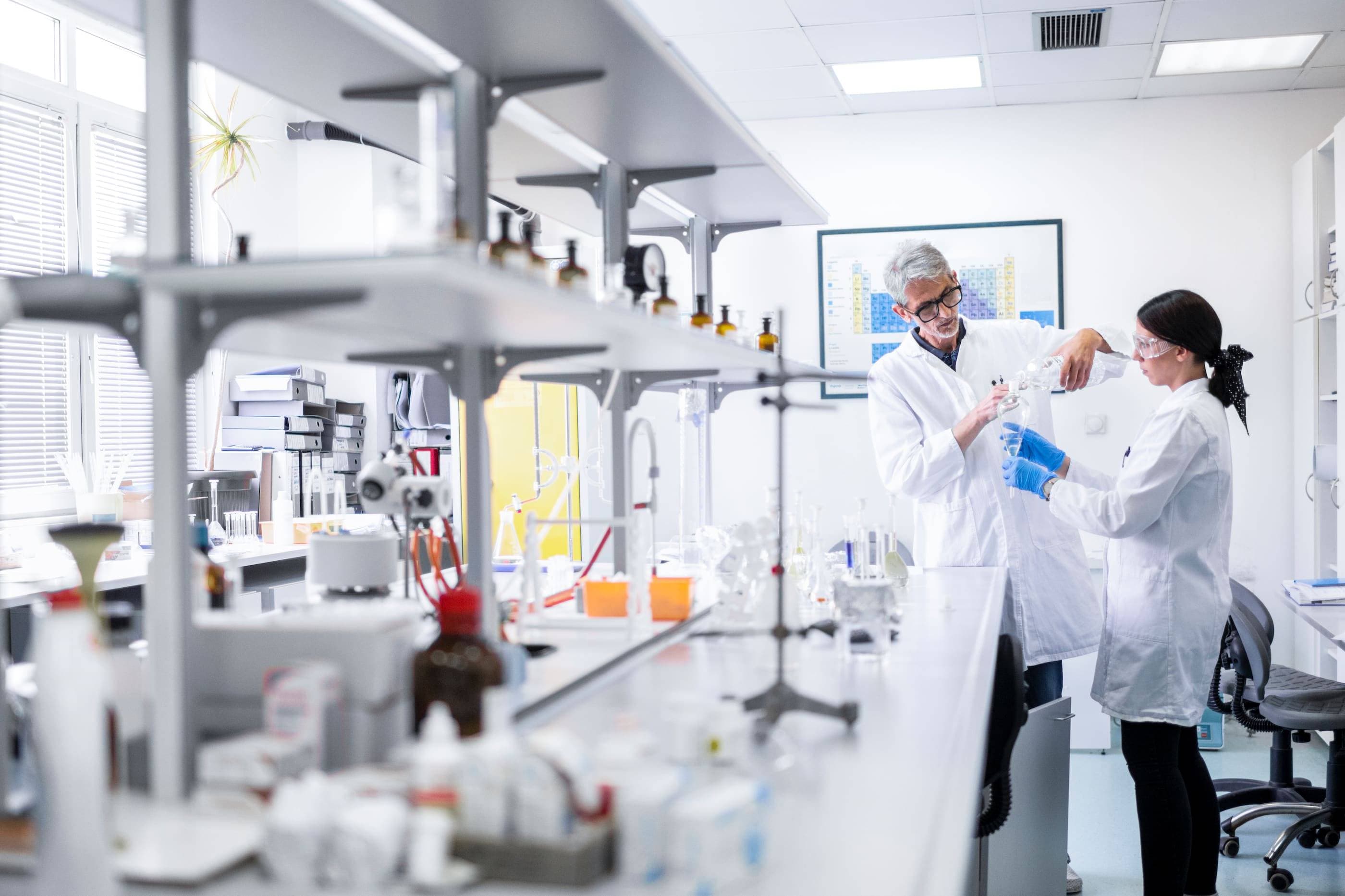 Two scientists working in a laboratory.