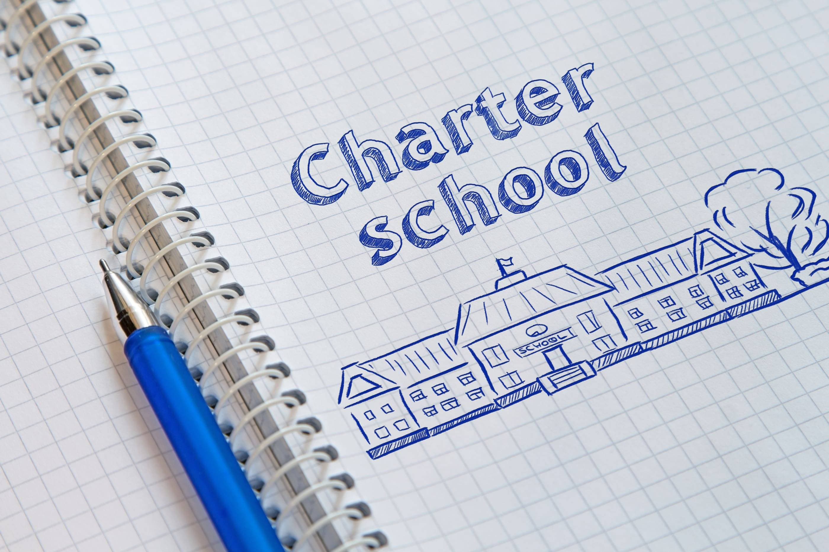 A notebook with the word charter school written on it.