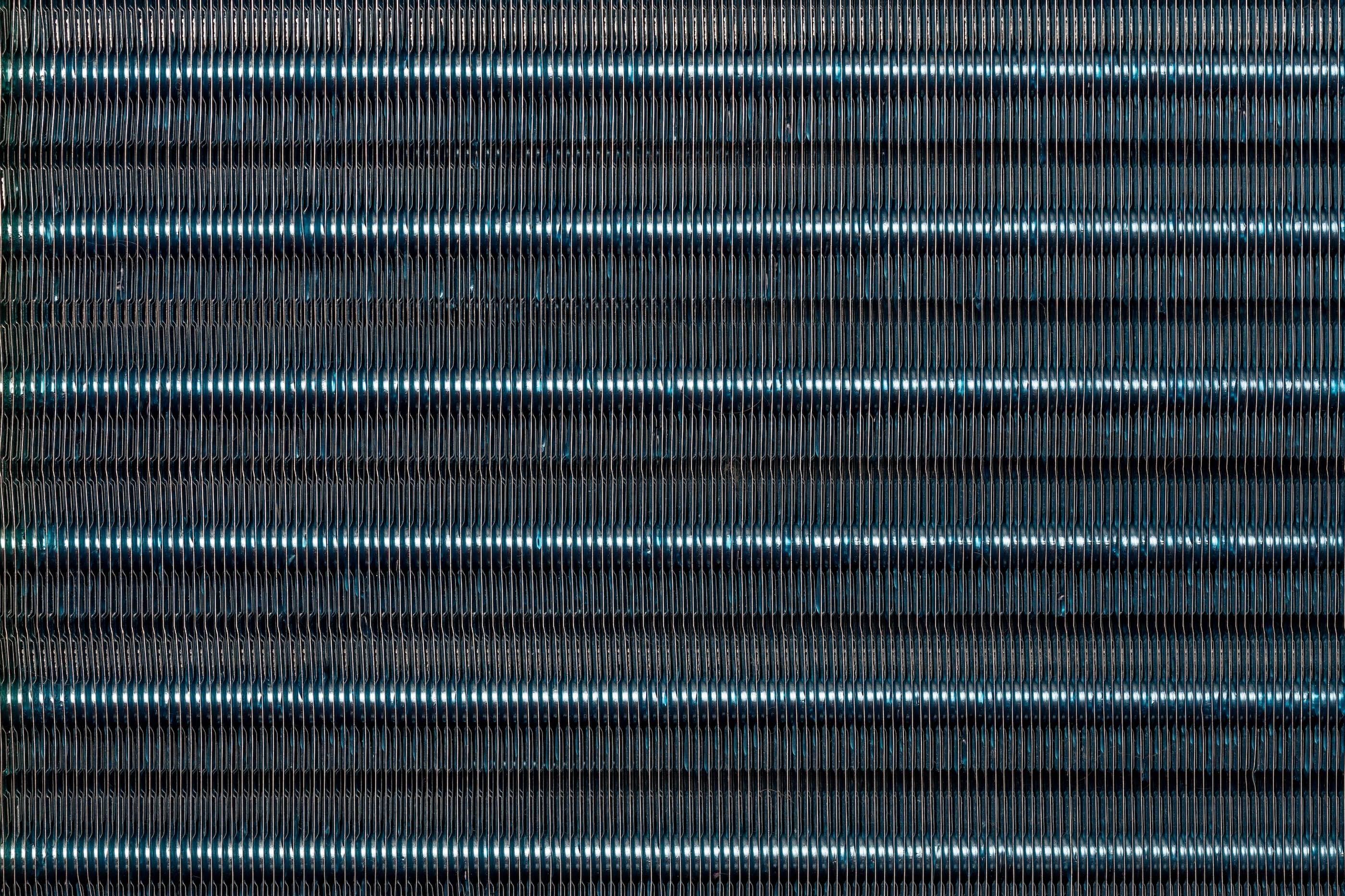 A close up image of a blue metal sheet.