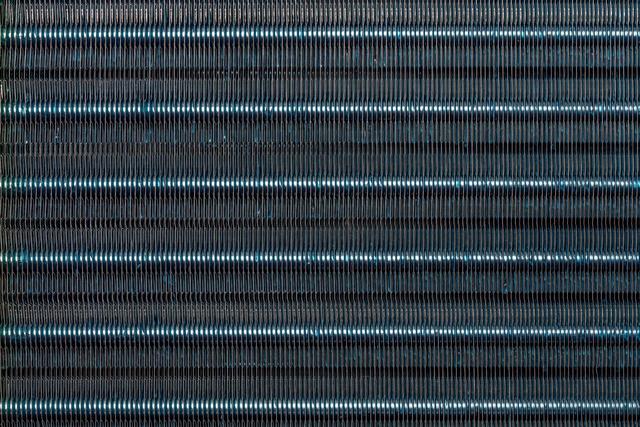 A close up image of a blue metal sheet.